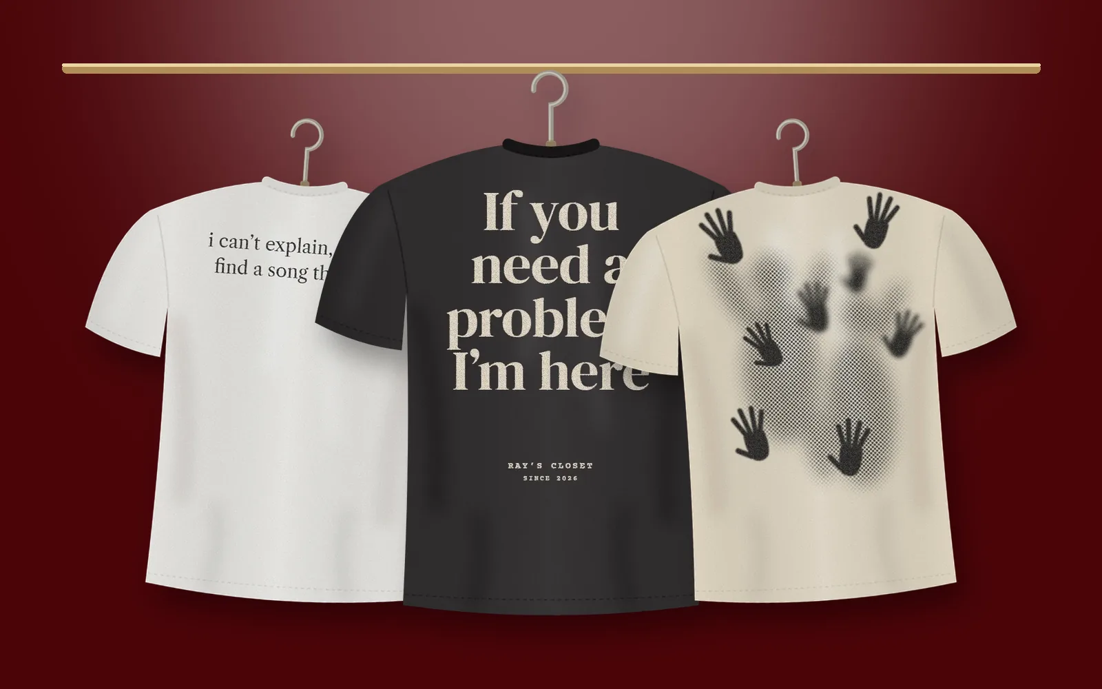 Three bold slogan tees from Say It Out Loud on a maroon wall