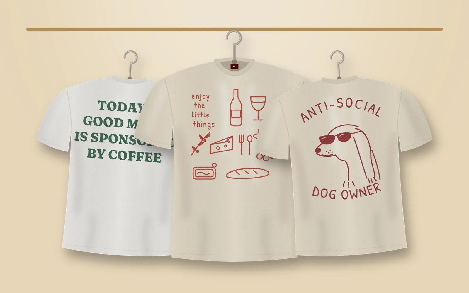 Three cream and white tees from Slow Mornings on a brass rail